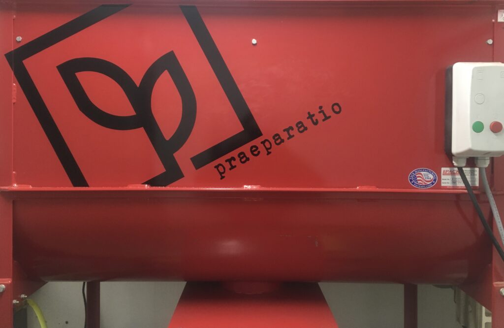 An image of a ribbon mixer for mixing mushroom substrate.